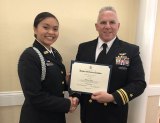 Senior NJROTC Unit Commander Brianne Lopez, shown here with the program's instructor, Lt. Cmdr. John Wolstenholme accepted the Daughters of the American Revolution Award recently.